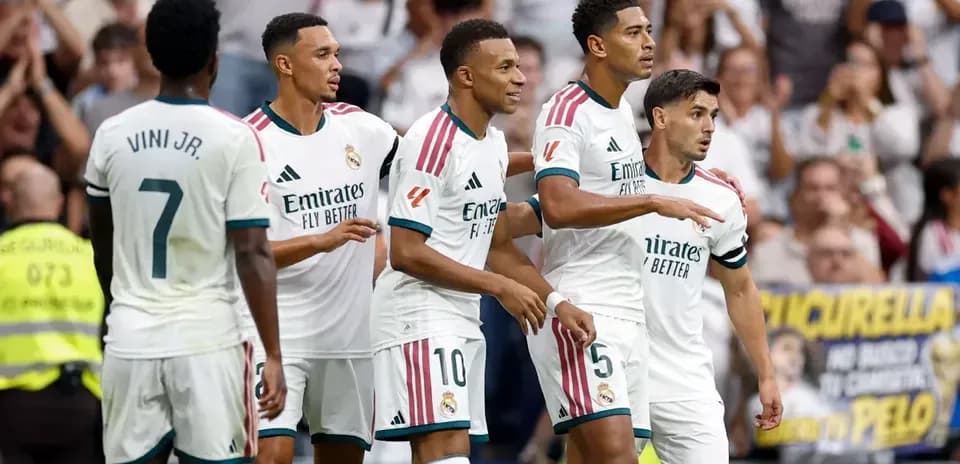 Real Madrid players celebrating a goal during match