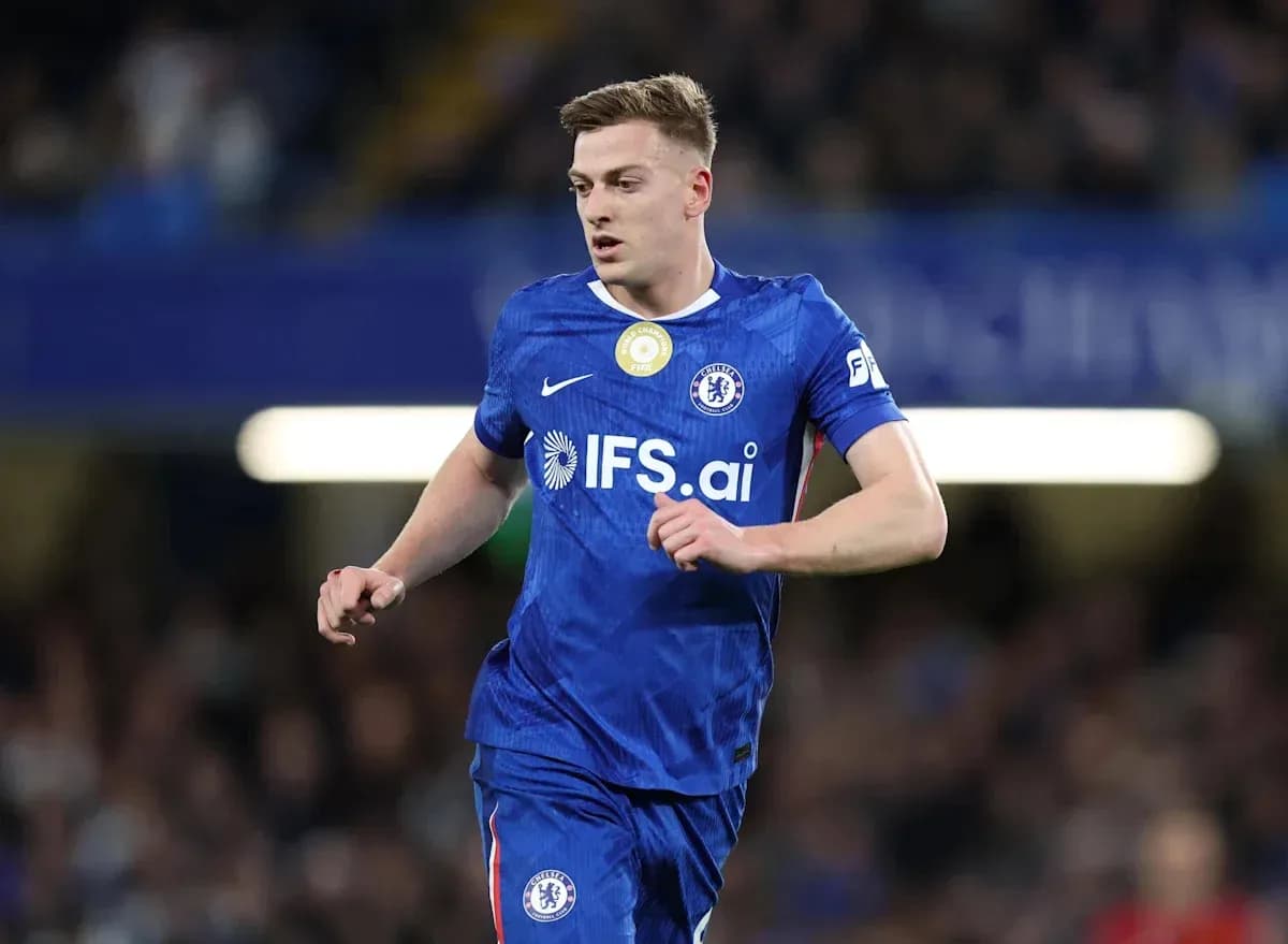 Player running in blue Chelsea kit during match