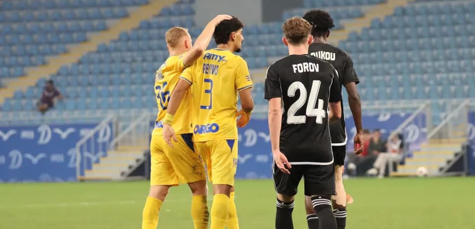 Players celebrating during Maccabi Tel Aviv match