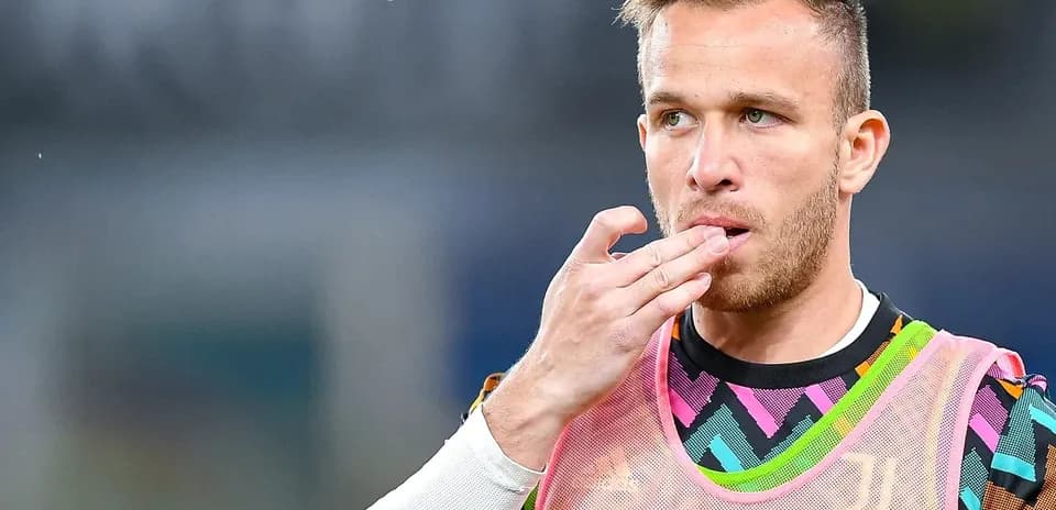 Player in colorful training gear touching his lips