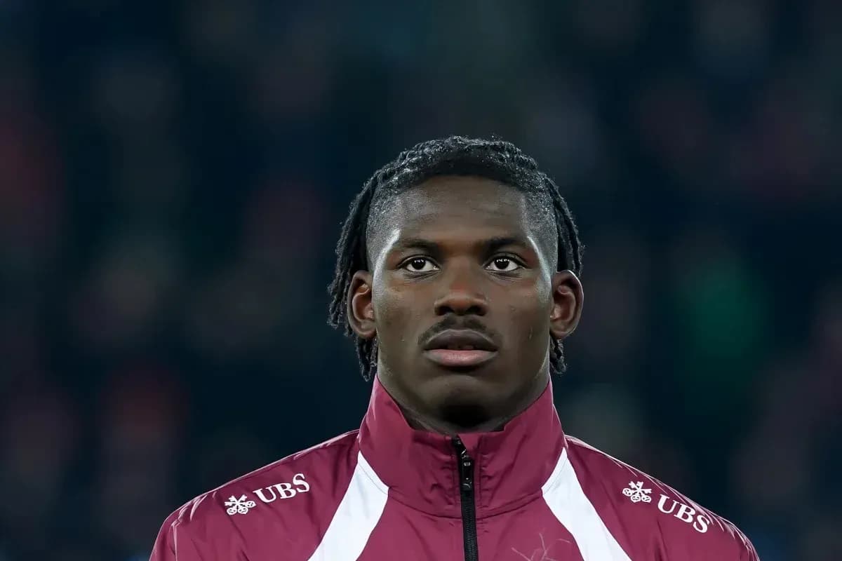 Player in warm-up jacket during match preparation