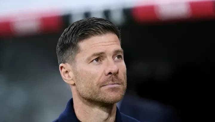 Coach observing the game from the sidelines