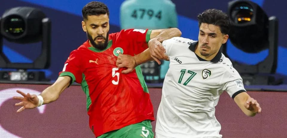 Two players competing for the ball during match