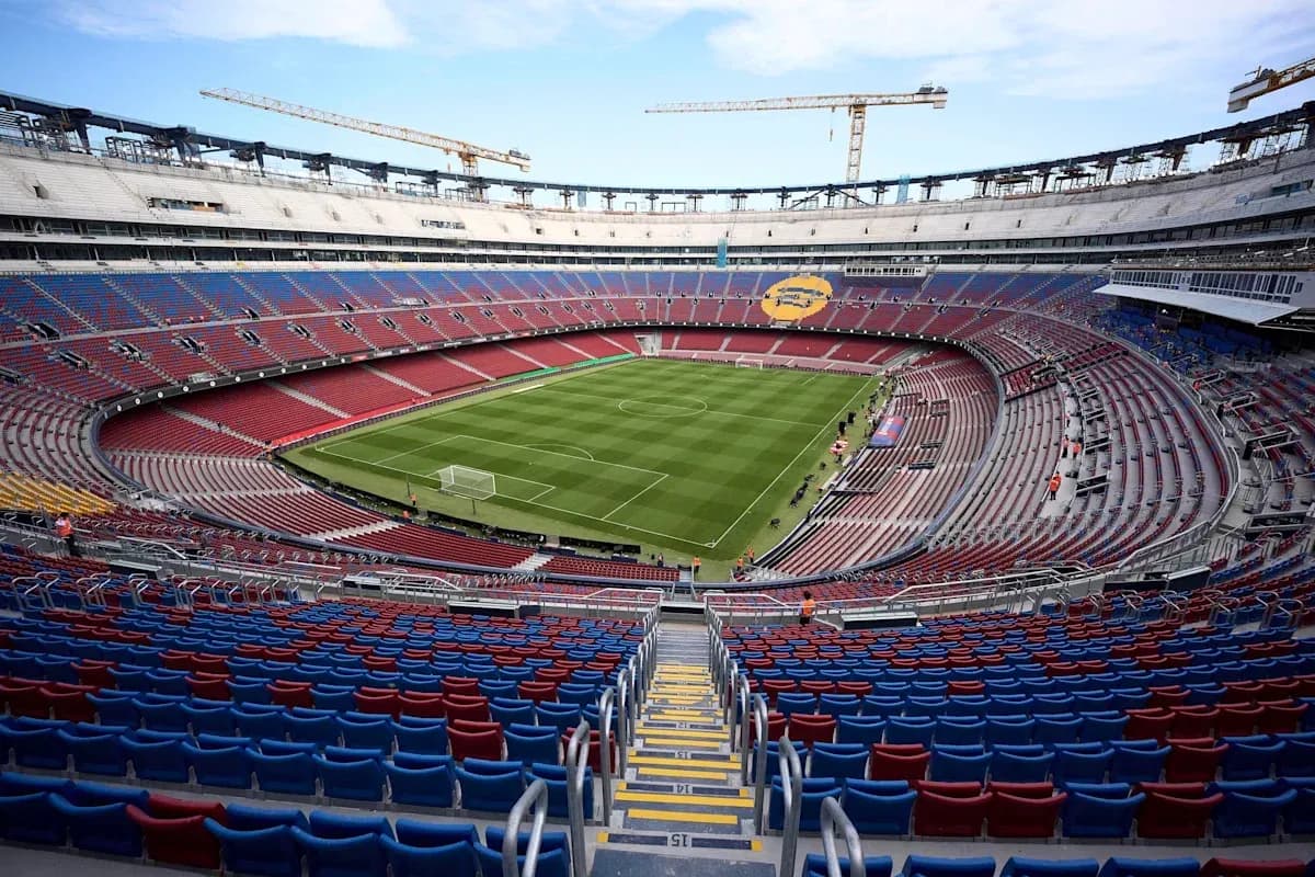 View of empty stadium with football pitch under construction
