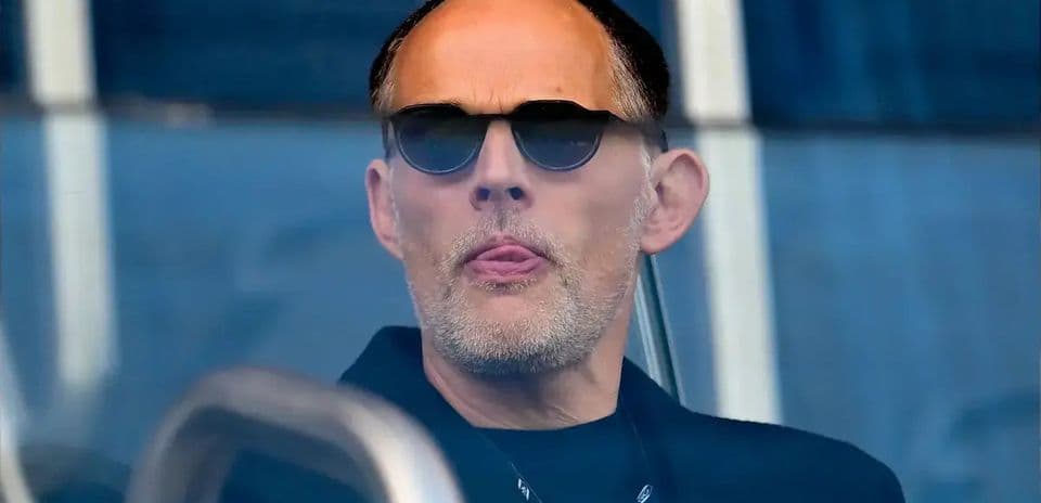 Man wearing sunglasses in a viewing area