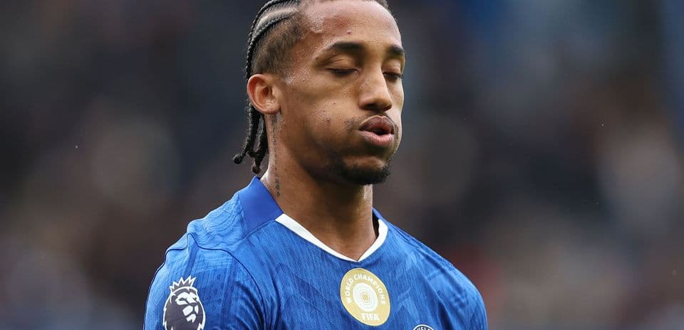 Player in Chelsea kit during match action