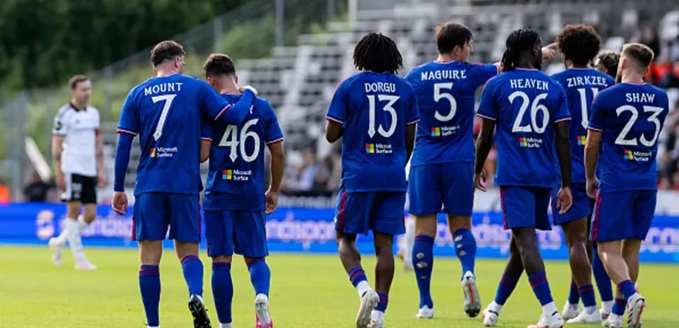 Players celebrating together on the field