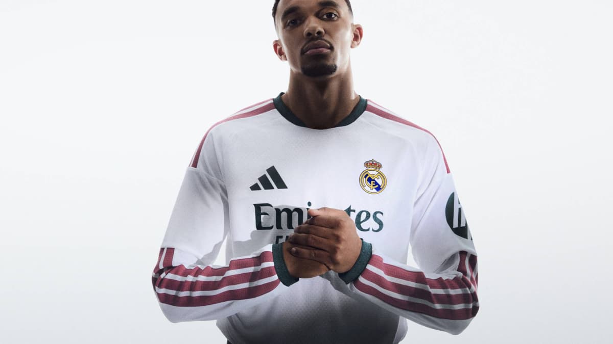 Player in Real Madrid jersey posing confidently