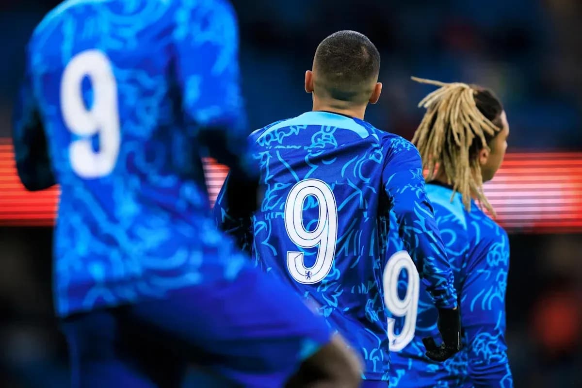 Players wearing blue jerseys with number 9 visible
