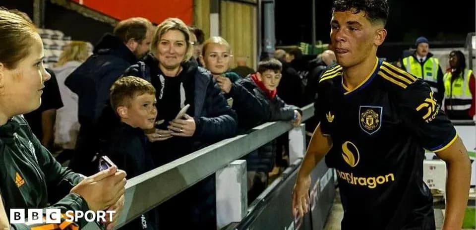 Player walking past fans after a match
