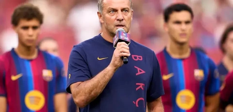 Coach speaking during pre-match ceremony with players