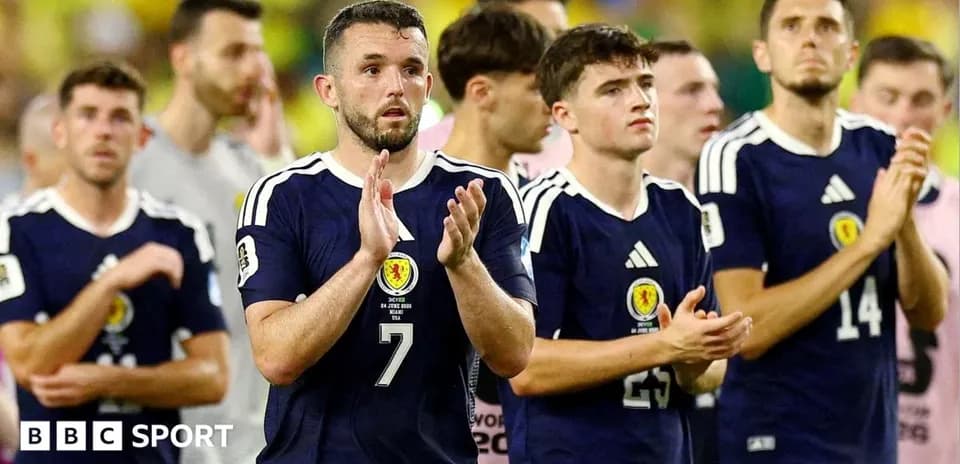 Scottish players applauding after a match