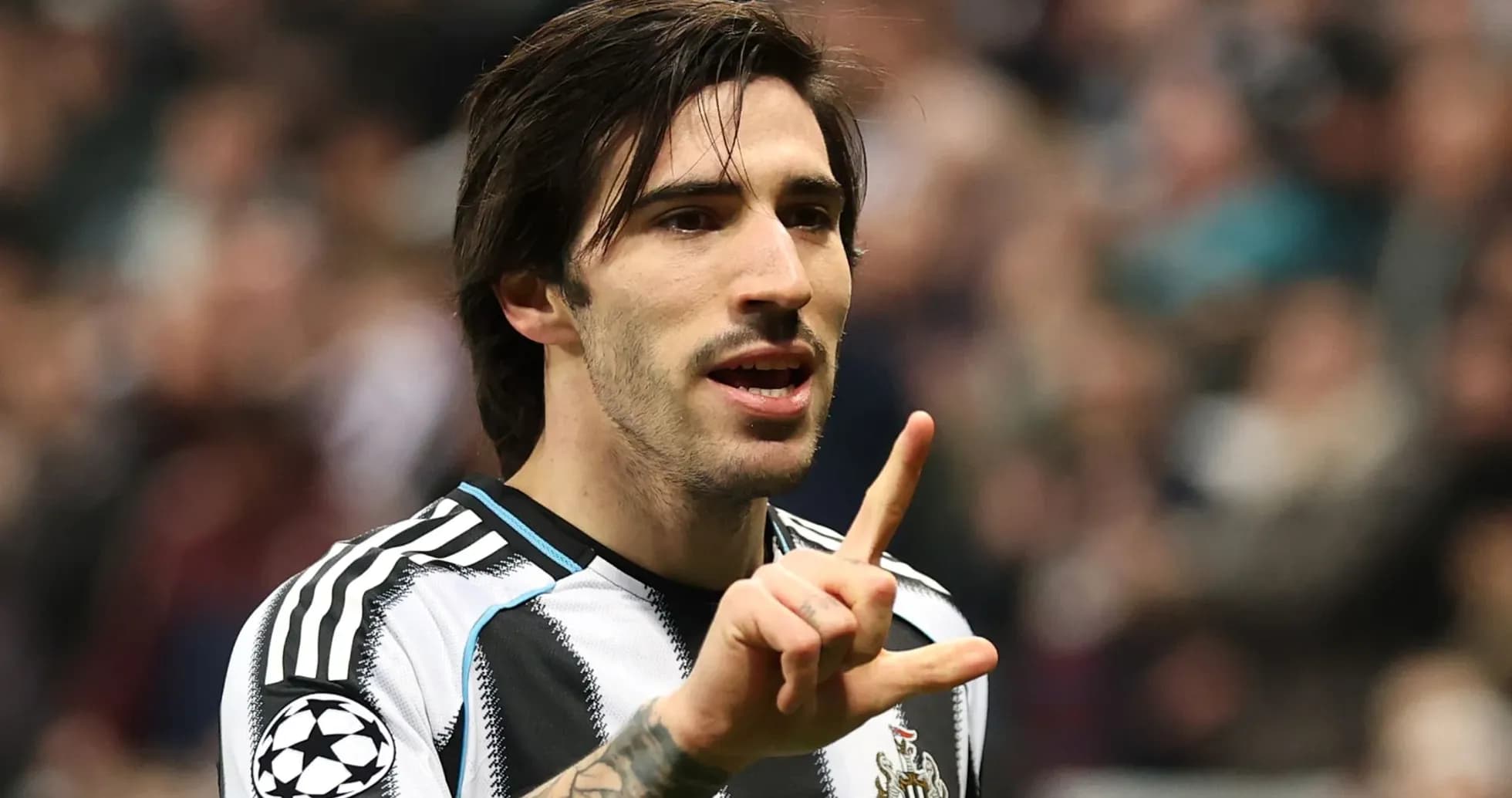 Player gesturing during a football match celebration