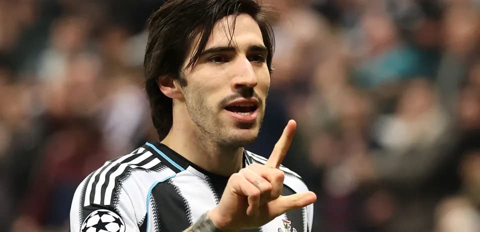 Player gesturing during a football match celebration