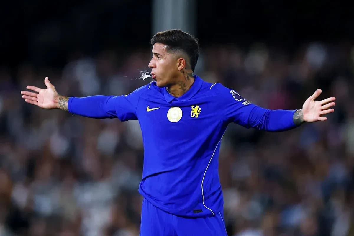 Player gesturing during match in blue jersey