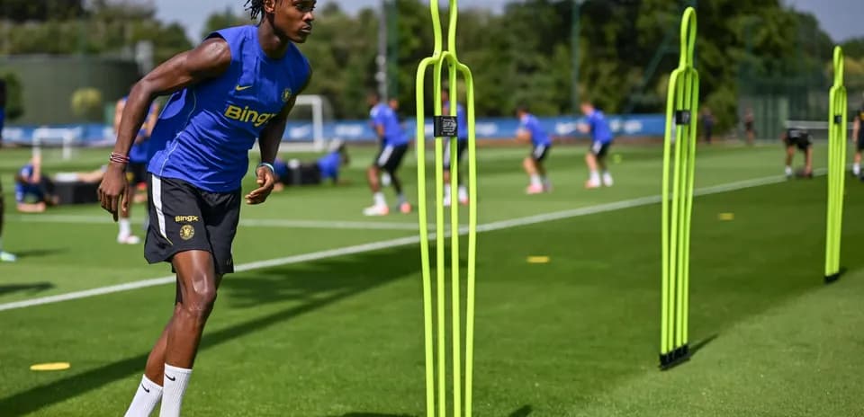 Player training with agility poles during practice session
