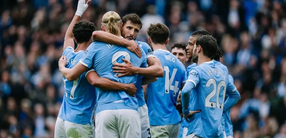Manchester City players celebrating a goal