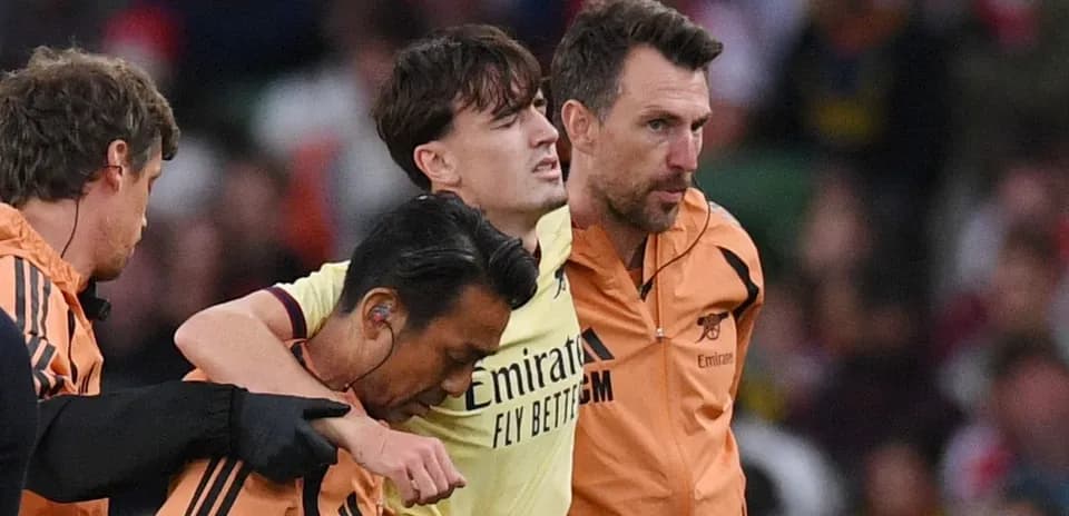 Player assisted off the field by medical staff