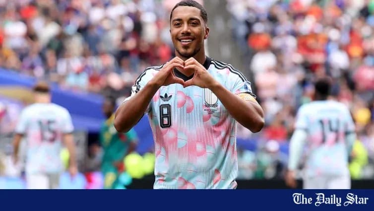 Player celebrating by making a heart shape