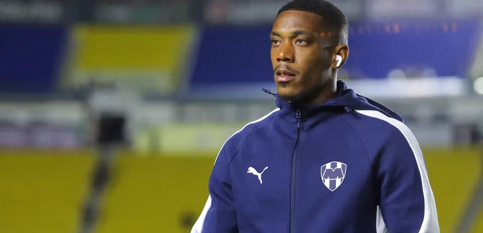 Player in warm-up gear before match at stadium