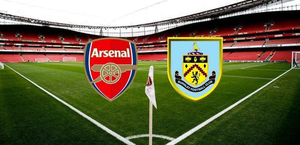 Arsenal and Burnley logos on the pitch