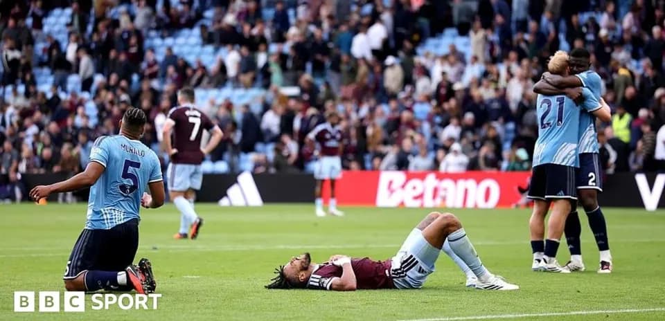 Players reacting after a match on the field