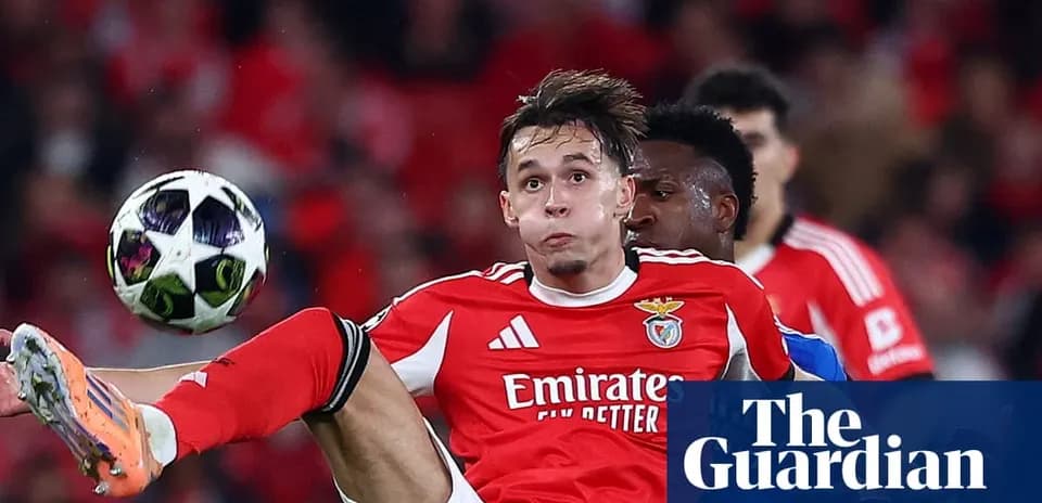 Benfica player attempting to control ball during match