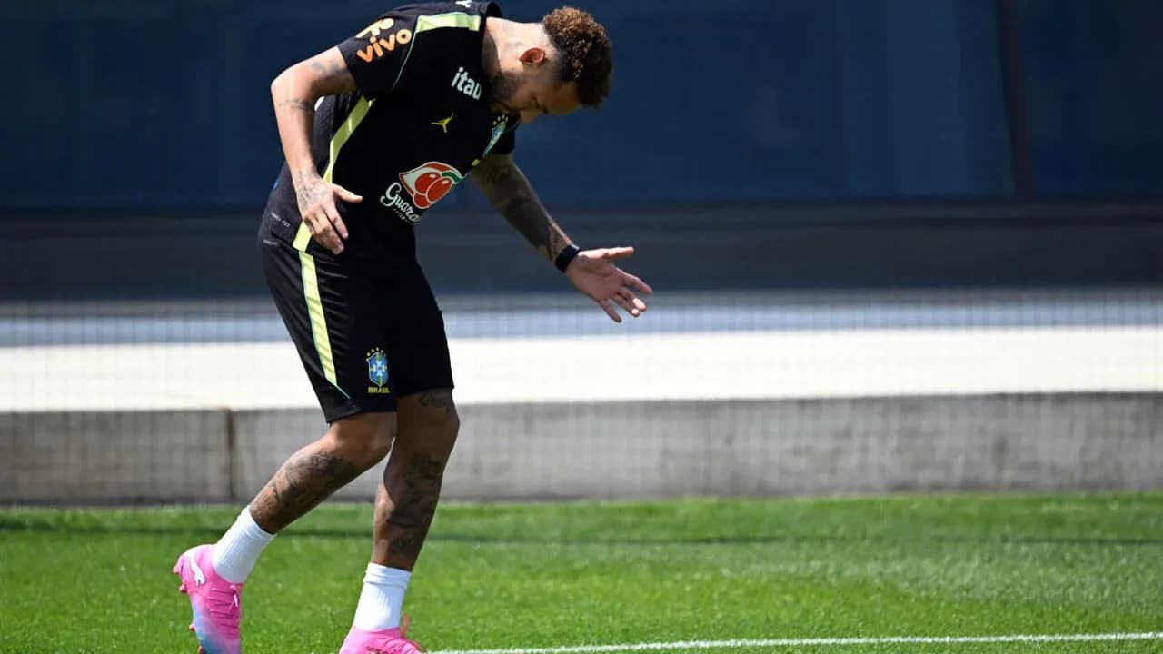 Player training on the field in Brazil kit