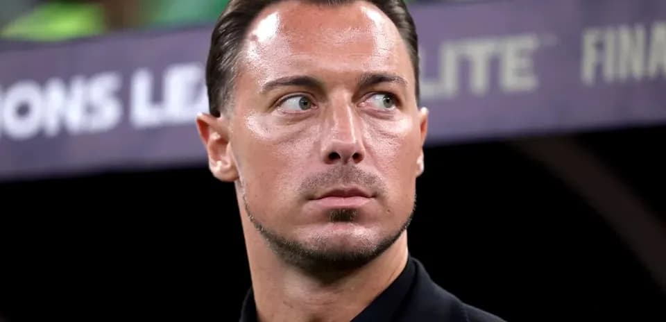 Coach looking focused during a match