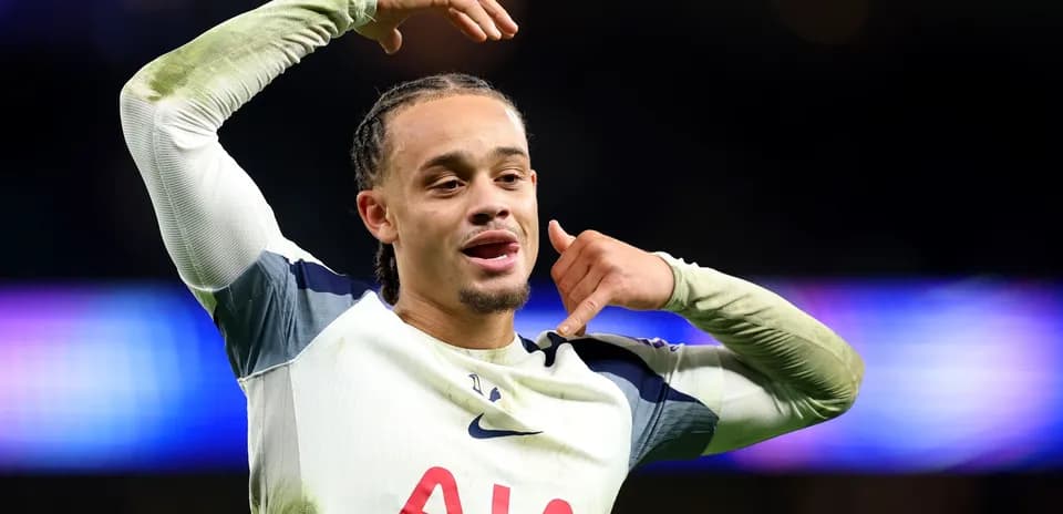 Player celebrating with phone gesture after scoring