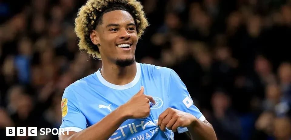 Player celebrating with thumbs up after scoring