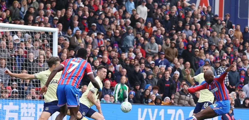 Crystal Palace player shoots on goal against Everton