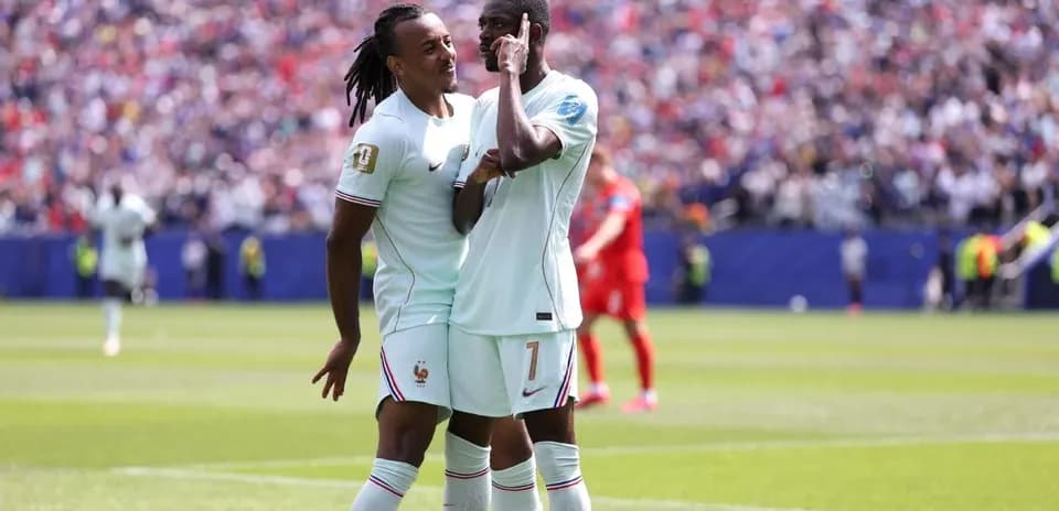 Players celebrating a goal during a match
