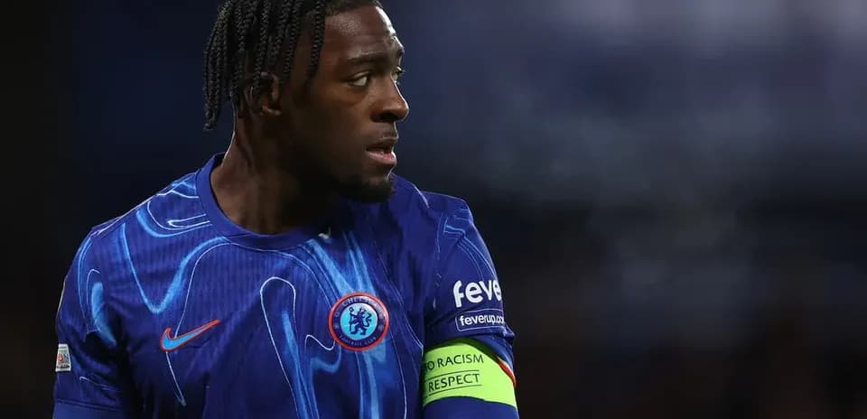 Player in Chelsea kit during match action