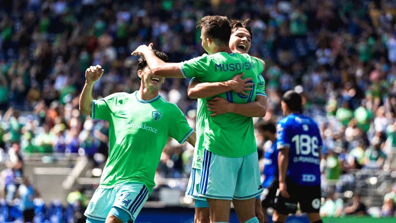 Seattle Sounders players celebrating a goal