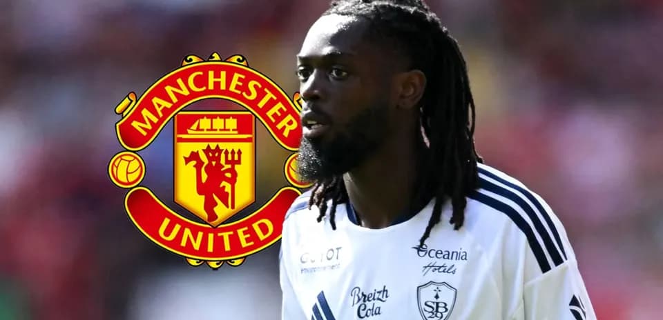 Player in white jersey with Manchester United logo