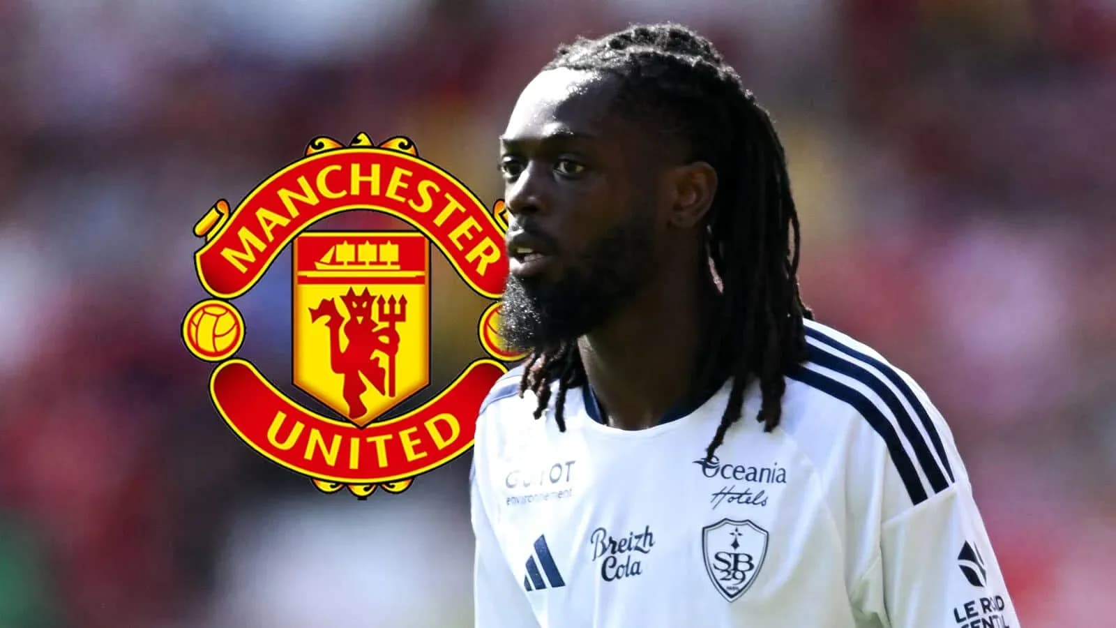Player in white jersey with Manchester United logo