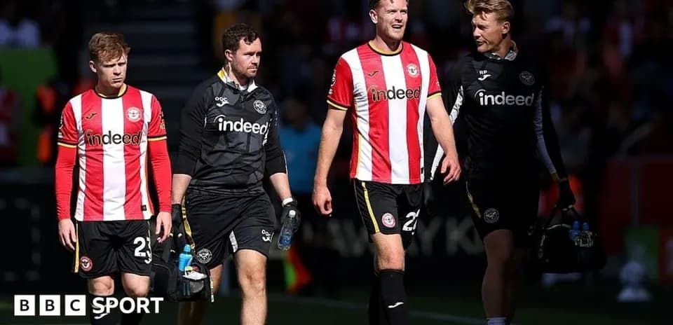 Brentford players walking off the pitch together