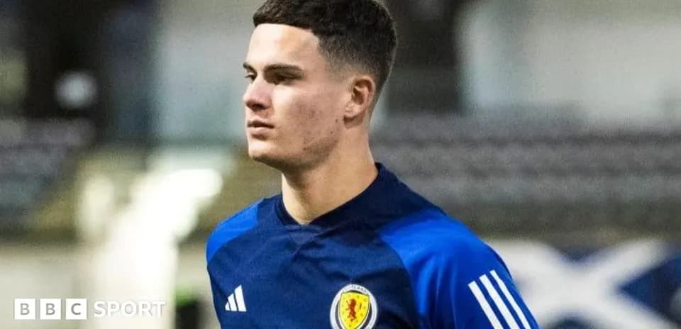 Player in Scotland training kit during warm-up