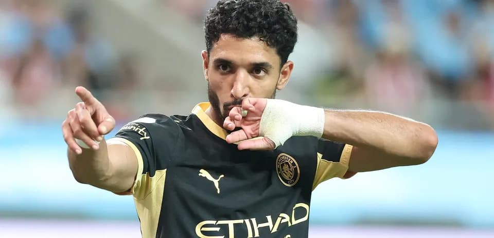 Player celebrating goal with finger gesture