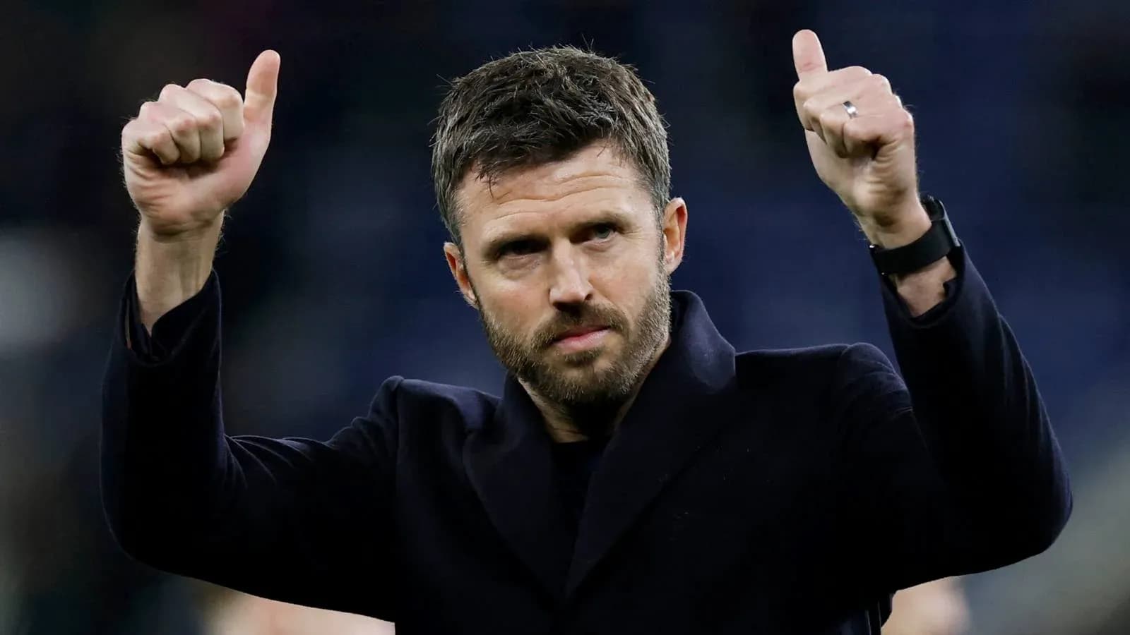 Man giving thumbs up gesture after match