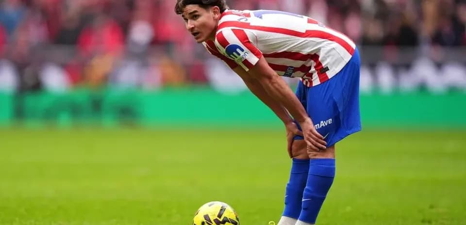 Player preparing for a free kick on field