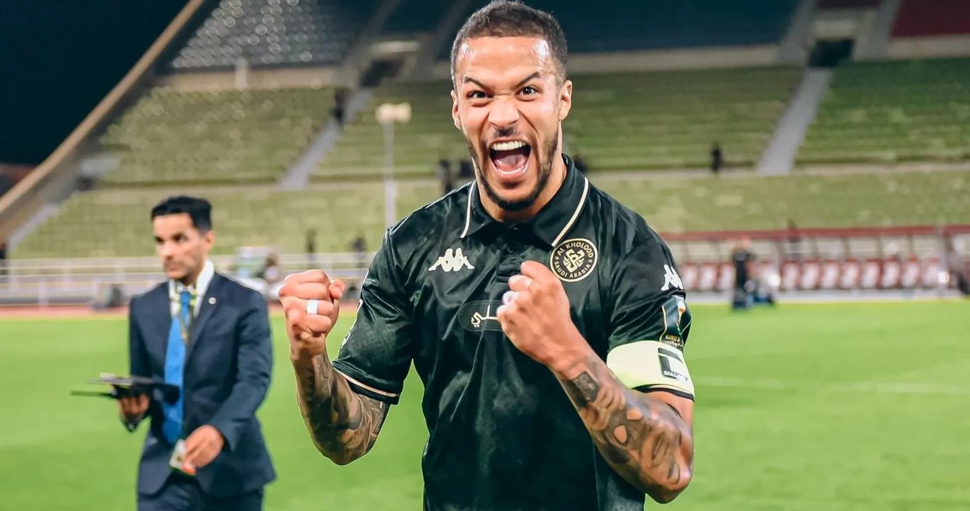 Al Kholood player celebrating victory on the field