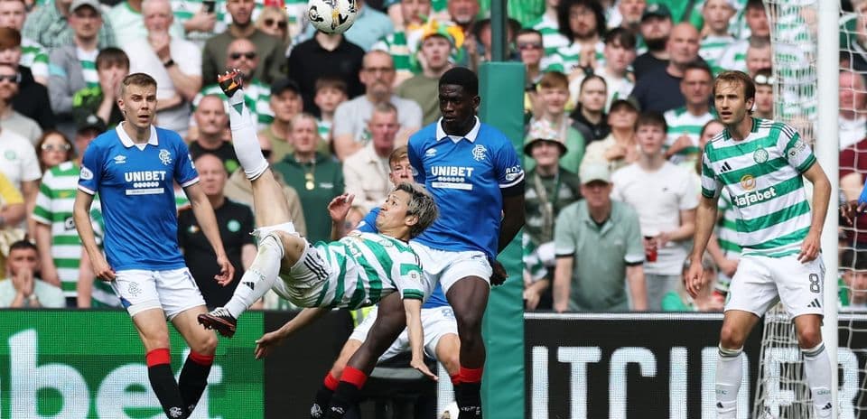 Player executing a bicycle kick during match