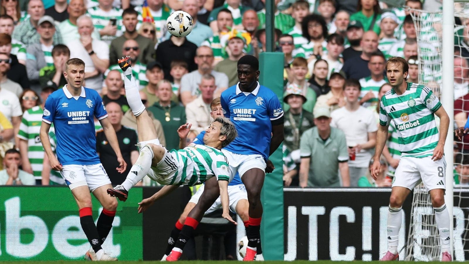 Player executing a bicycle kick during match