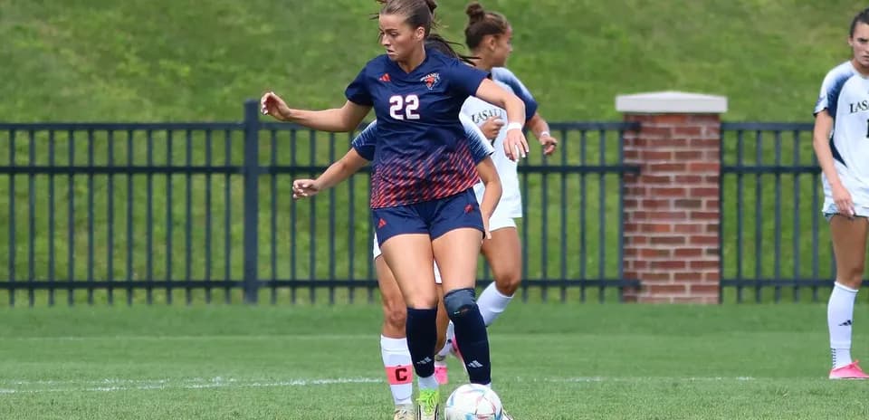Player dribbling the ball during soccer match