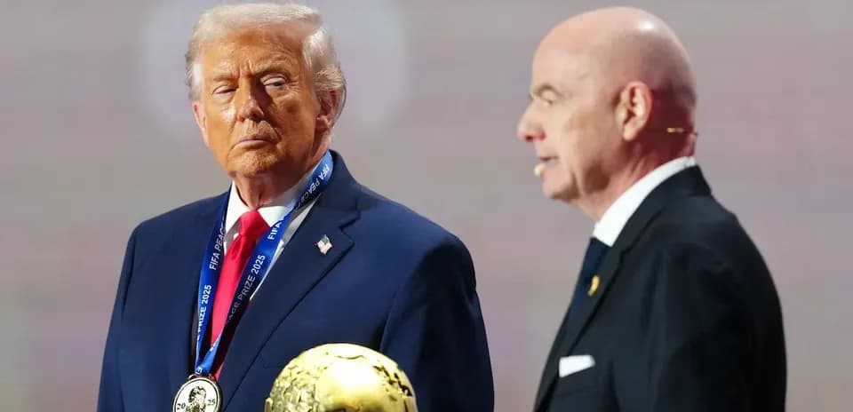 Donald Trump receiving award from FIFA president