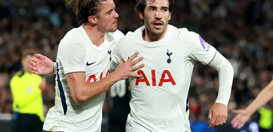 Tottenham players celebrating a goal during match