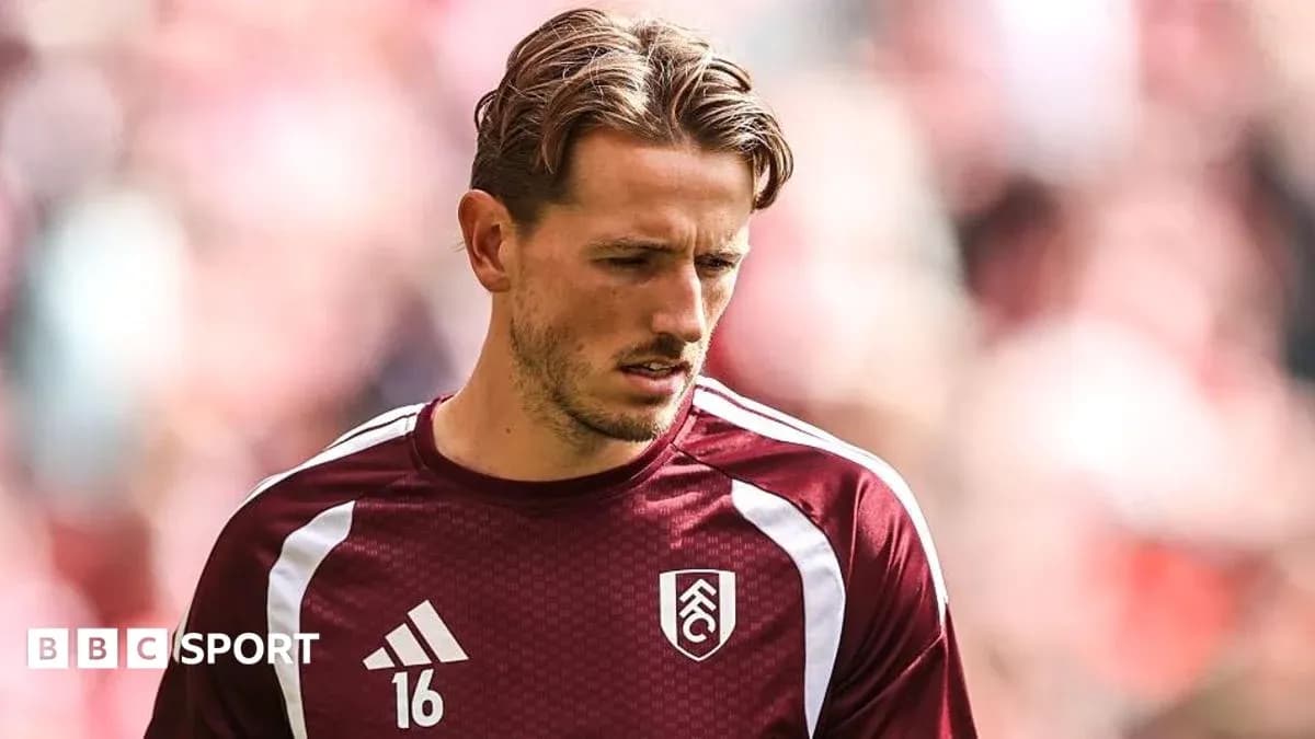 Player in Fulham kit during warm-up session