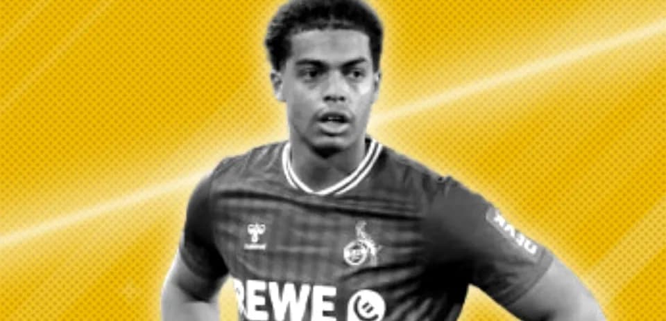 Player in REWE jersey on yellow background